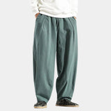 Navy blue men's linen pants featuring an elastic waist, designed for comfort and breathability, displayed in a large size.