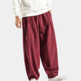 Navy blue men's linen pants with an elastic waist, designed to be breathable and eco-friendly, displayed with a focus on the waist and fabric texture.