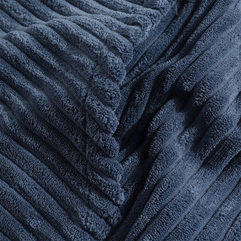 Navy blue ribbed corduroy pullover hoodie with a high collar and long sleeves, showcasing a textured pattern.