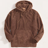 Brown ribbed corduroy pullover hoodie with a high collar and long sleeves, designed in a soft natural material.