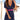 Woman wearing a navy blue summer mini dress with a pink belt, styled casually. The dress features short sleeves and is paired with sunglasses.