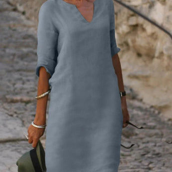 Navy blue V-neck shift dress with lightweight three-quarter sleeves and a midi length, available in size 3XL.