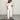 White wide-leg jumpsuit featuring 3/4 sleeves and a stylish collar, designed for plus size evening wear.