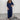 Navy blue wide-leg jumpsuit with 3/4 sleeves, designed for plus size evening wear in size 3XL, featuring a one-piece garment style with a defined waist and elegant shoulder and neck details.