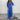 Navy blue wide-leg jumpsuit with 3/4 sleeves, designed for plus-size evening wear.
