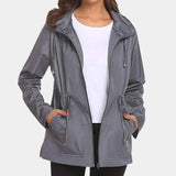 Gray XL women's lightweight hooded parka, showcasing a water-resistant material. The jacket features a hood, long sleeves, and a front closure, highlighting its practical and stylish outerwear design.