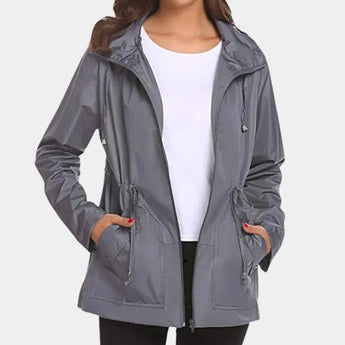 Gray XL women's lightweight hooded parka, showcasing a water-resistant material. The jacket features a hood, long sleeves, and a front closure, highlighting its practical and stylish outerwear design.