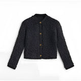 Navy Bouclé Jacket in black, large size, featuring a chunky knit design with a button closure, collar, and long sleeves, made from woolen material suitable for winter wear.
