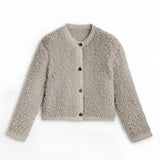 Navy bouclé jacket for women featuring a chunky knit design, long sleeves, and a woolen texture. The cardigan is styled for winter wear, with a collar and a patterned appearance. The color variant in the image is khaki, size large.