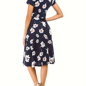 Navy floral A-line dress with short sleeves and knee-length hem, perfect for casual summer outings.