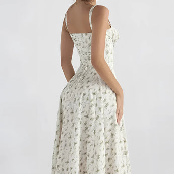 Navy ruched beach dress with adjustable bust, modeled by a woman, showcasing the dress's sleeveless design and stylish ruched detail.