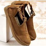 Men's navy suede chukka boots with a stylish design, featuring a mix of brown and beige tones, crafted from natural leather materials.