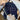 Navy women's stylish short jacket with zip closure, featuring double pockets and long sleeves, displayed on a clothes hanger in a marine blue color, size 2XL.