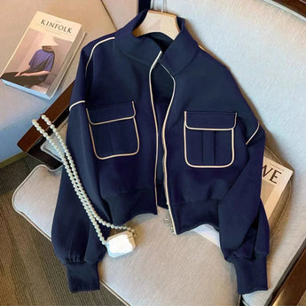 Navy women's stylish short jacket with zip closure, featuring double pockets and long sleeves, displayed on a clothes hanger in a marine blue color, size 2XL.