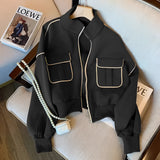 Navy women's stylish short jacket with a zip closure and double pockets, featuring a sleek black design in size 2XL, highlighting elements like a collar and sleeves typical of outerwear fashion.