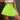 Neon green high-waisted pleated tennis skirt in a skort design, shown in a yellow-green color, size 2XL, worn by a model.