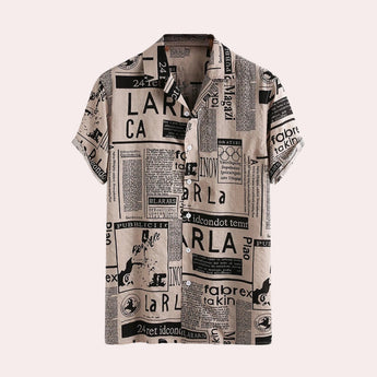 Khaki XL newspaper print shirt with a modern vintage urban fashion design, featuring a dress shirt style with short sleeves and a collar.