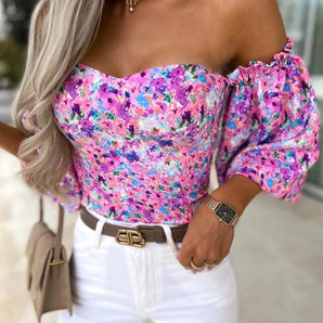 Off-shoulder puff sleeve floral top in a Viola color, designed for trendy spring fashion, featuring a loose fit with a prominent neckline and stylish sleeves in a 2XL size.