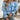 
A stylish off-shoulder ruffle blouse in blue with a bow-tie front design, featuring a loose fit and long sleeves, perfect for adding a fashionable touch to any outfit.