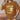 Cartoon Oktoberfest-themed T-shirt featuring the phrase "Frank & Stein Beer Festival," shown in a coffee color and size XL, with a focus on the sleeve and neck area, worn by a person.
