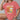 Oktoberfest-themed cartoon t-shirt featuring a whimsical design of "Frank & Stein" characters enjoying a beer festival, printed on a rose-colored fabric. The shirt is displayed in an XL size, with emphasis on the sleeves and neckline.