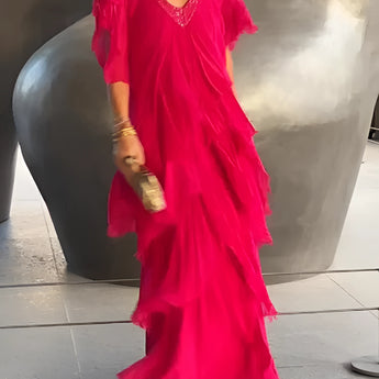 Pink and red Bohemian tiered midi dress in a vintage chic style, featuring a one-piece design with a fitted waist, flowing skirt, and elegant sleeves, suitable for formal wear.