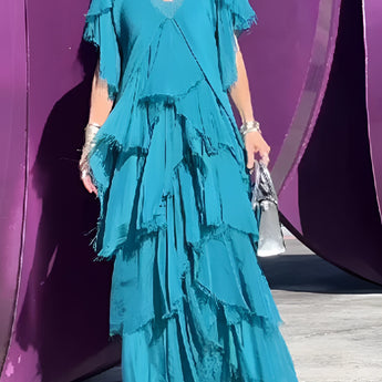 Olive Green Bohemian Tiered Midi Dress with vintage chic design, featuring a fitted waist, elegant sleeves, and a comfortable neckline.