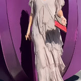Olive green bohemian tiered midi dress with vintage chic style, featuring a flowing silhouette and long sleeves, suitable for a plus-size fit in 5XL.