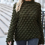 Olive green chunky knit pullover with puff sleeves, featuring a cozy fall fashion design, displayed on a mannequin with emphasis on the textured fabric and sleeve detailing.