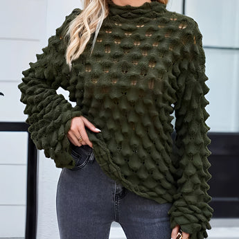 Olive green chunky knit pullover featuring puff sleeves, displayed on a mannequin, showcasing fall fashion style. The pullover is made from a textured knit textile with a round neck and ribbed cuffs, suitable for the XXL size variant.
