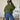 Olive green cropped bomber jacket for women with long sleeves and ribbed waist, styled as urban streetwear, displayed on a mannequin against a plain backdrop.