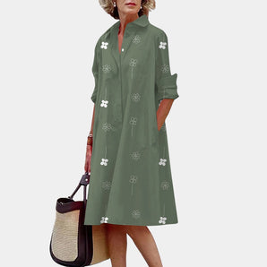 Olive green floral embroidery women's button-up shirt dress in size 3XL, featuring a collar, long sleeves, and a waistline that accentuates the figure.