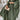 Olive green high-waisted pleated maxi skirt in a bohemian crinkled style, shown in size 3XL.
