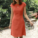Olive green linen knee-length A-line dress featuring a V-neck and short sleeves, shown in an orange color variant, size XL.