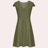 Olive green linen knee-length A-line dress featuring a V-neck and short sleeves.