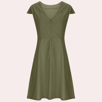 Olive green linen knee-length A-line dress featuring a V-neck and short sleeves.