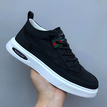 Olive green low-top men's urban casual sneakers made of breathable canvas, displayed against a neutral background.
