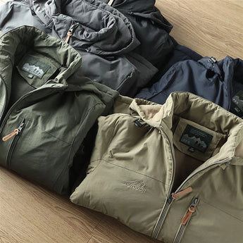 Olive green men's lightweight hooded windbreaker jacket designed for water resistance, featuring long sleeves and subtle branding.