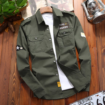 Olive green men's tactical long sleeve military shirt in size 2XL, featuring a durable and breathable fabric with a classic collar, button-front closure, and chest pockets, designed for functionality and fashion.