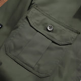 Olive green men's tactical long sleeve military shirt featuring a button-up front with a collared neckline, made from durable and breathable material.