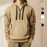Olive green men's zipper hoodie with a kangaroo pocket, featuring long sleeves and a comfortable fit, styled for casual streetwear.
