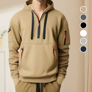 Olive green men's zipper hoodie with a kangaroo pocket, featuring long sleeves and a comfortable fit, styled for casual streetwear.