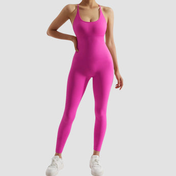 Olive green seamless women's athletic bodysuit shown in a pink color variant, size XL, featuring a moisture-wicking fabric. The bodysuit highlights the arm, shoulder, neck, waist, and leg areas, designed for a comfortable and flexible fit.