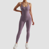 Olive green seamless women's athletic bodysuit featuring moisture-wicking fabric, shown in size XL, with a form-fitting design that highlights the arms, legs, and waist for optimal movement during workouts.