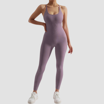 Olive green seamless women's athletic bodysuit featuring moisture-wicking fabric, shown in size XL, with a form-fitting design that highlights the arms, legs, and waist for optimal movement during workouts.