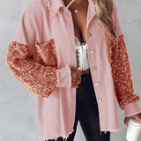 Olive green oversized boho shirt with sequin patchwork, featuring a distressed hem and long sleeves.