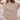 Olive green short sleeve knit sweater with pocket designed for women's summer wear, featuring a round neckline and relaxed fit, shown in a beige color and XL size.