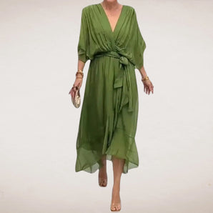Olive green silk midi wrap dress featuring a V-neck design in a bohemian summer style, with sleeves and a defined waist, suitable for formal events or day wear, shown in size 3XL.
