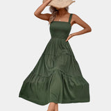 Olive green smocked bodice strappy midi dress in size XL, featuring sleeveless design with thin straps, fitted waist, and flowing skirt.