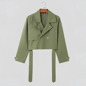
A women's olive green cropped blazer featuring a tie-waist design, suitable for office settings. The blazer has long sleeves, a structured collar, and a tailored fit, blending professional style with contemporary fashion.